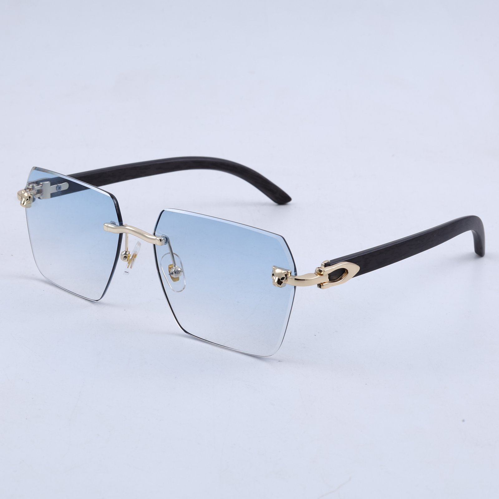 OG Arctic Phantom | Luxury Rimless Ice Blue Geometric Sunglasses with Gold Skull Temples