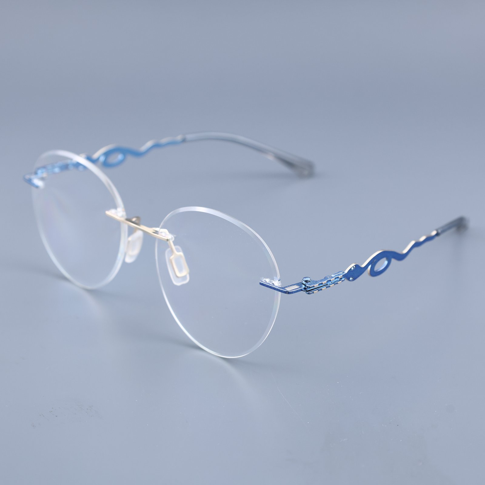 OG Azure Wave | Rimless Round Sunglasses For Women